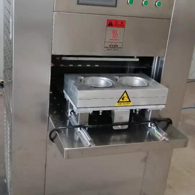 JCFW-4雙工位片膜封口機(jī)凍榴蓮小銀魚(yú)